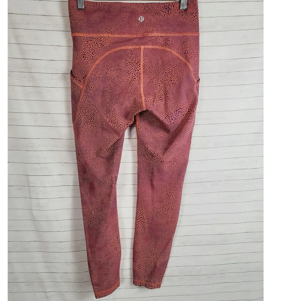 Lululemon Invigorate High-Rise Tight 25” in Crackle Orange, sz 6